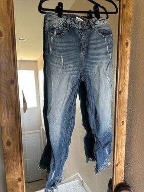 Distressed Blue Denim Jeans